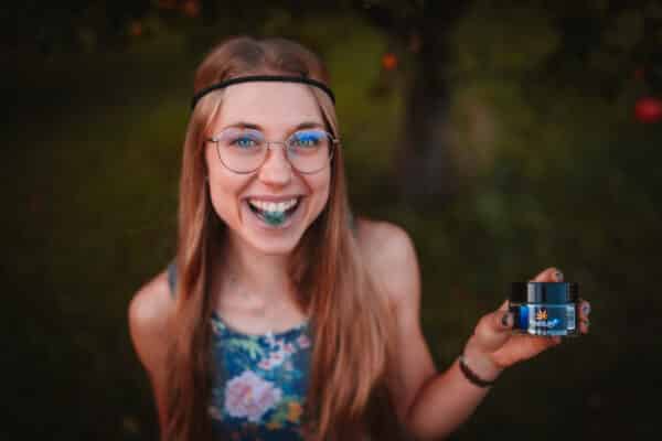 cbd candies and smiling girl